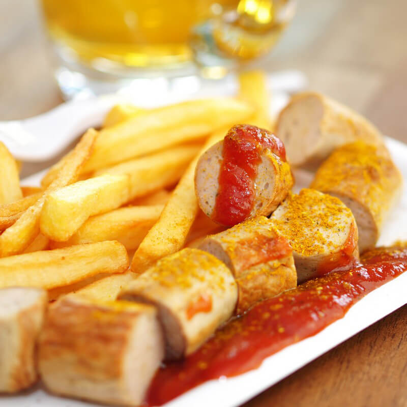 Die Currywurst als beliebter Snack der Deutschen Die Currywurst als beliebter Snack der Deutschen