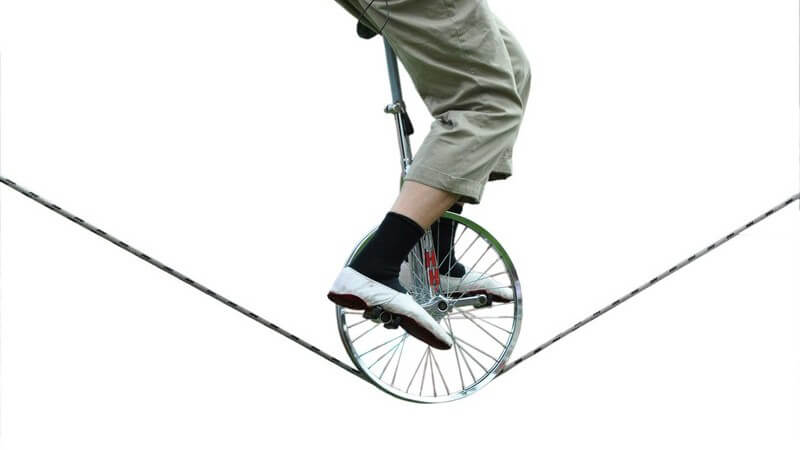 Einradfahrer auf Hochseil, Akrobatik