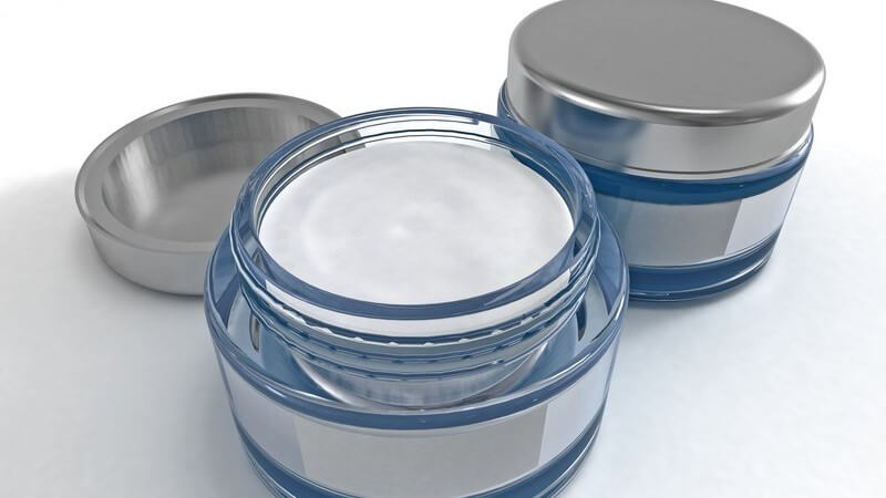 Grafik zwei Döschen mit Creme, weißer Hintergrund